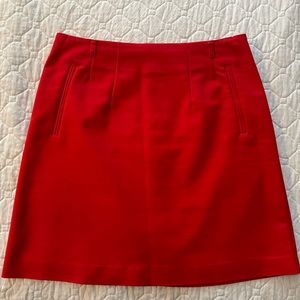 Red pencil skirt with faux pockets